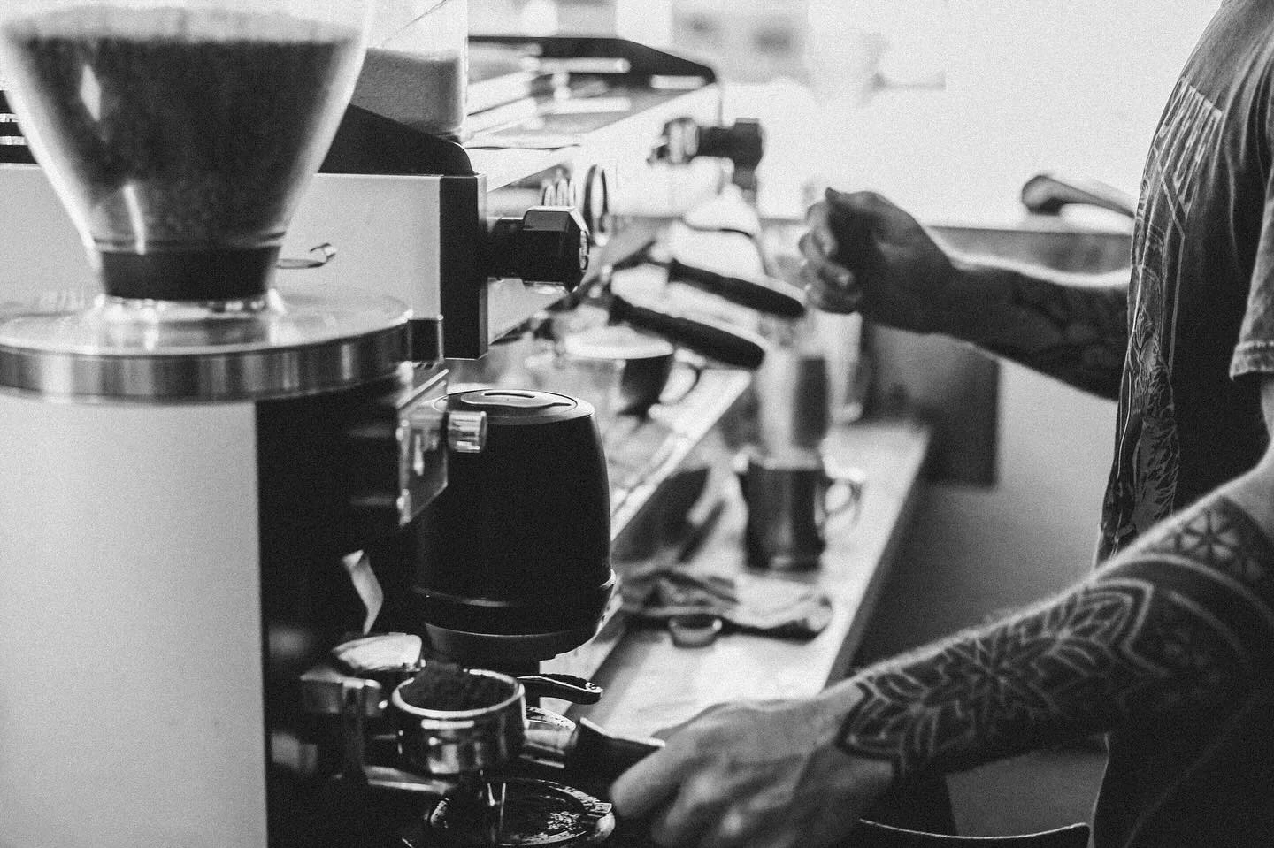 Close up of barista preparing coffee